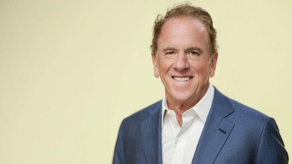 speaker John B. Quinn